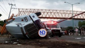 Buscan a dominicanos desaparecidos tras accidente trailer