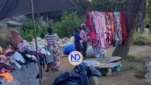 Haitianos «se adueñan» de la entrada al Salto de Aguas Blancas… y nadie hace nada