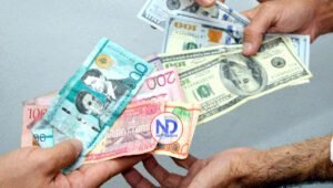Dólar estadounidense baja dos centavos y se cambia RD$58.82