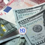 El dólar bajó 18 cts. y el euro 5; eran vendidos a $58.87 y $69.64